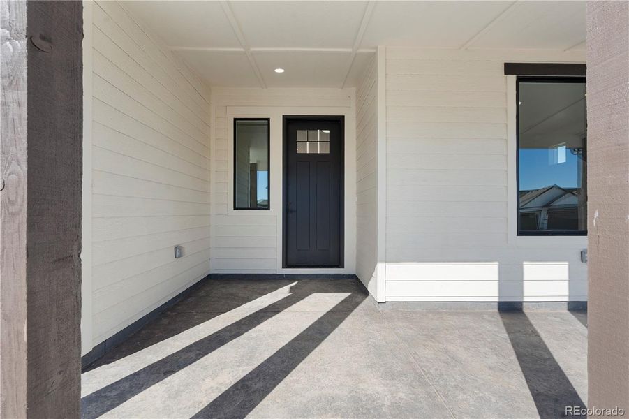 stamped concrete covered porch