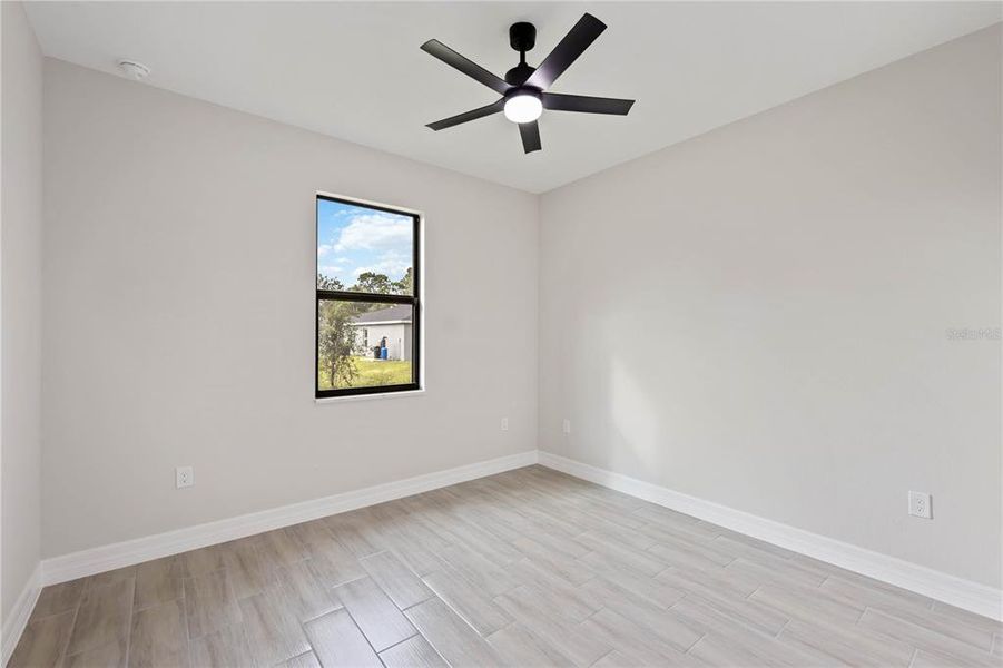 Spacious, unfurnished interior of a new home in , Port Charlotte (Image 24).