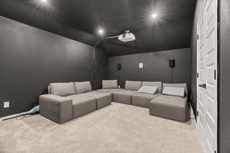 Create an immersive cinematic experience with this dedicated media room. Create an immersive cinematic experience with this dedicated media room.