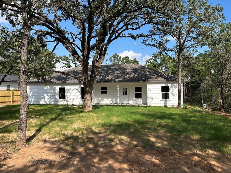 Front exterior of a new home in , Bastrop, TX, highlighting curb appeal (Image 21). Front exterior of a new home in , Bastrop, TX, highlighting curb appeal (Image 21).