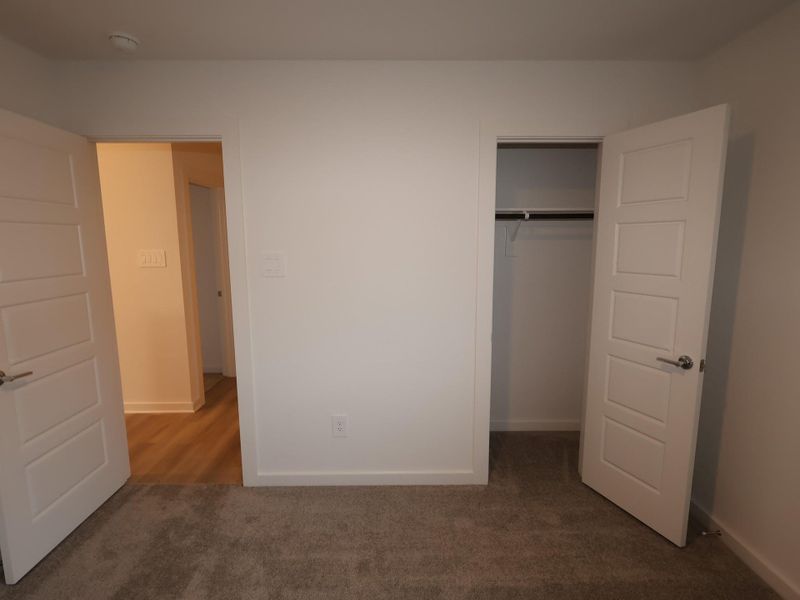 Spacious, unfurnished interior of a new home in Pinewood at Grand Texas, New Caney (Image 29).