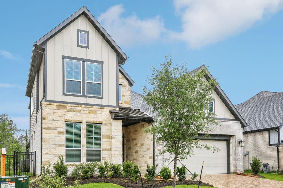 Front exterior of a new home in , Montgomery, TX, highlighting curb appeal (Image 2). Front exterior of a new home in , Montgomery, TX, highlighting curb appeal (Image 2).