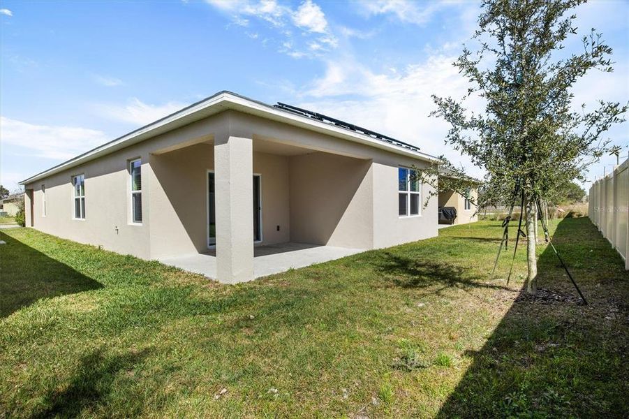 Exterior details and patio area of a home in Cadence at Parc Hill, Orange City (Image 16).