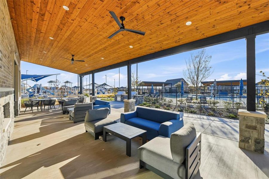 View of patio / terrace with an outdoor living space, outdoor dining space, ceiling fan, and a pool