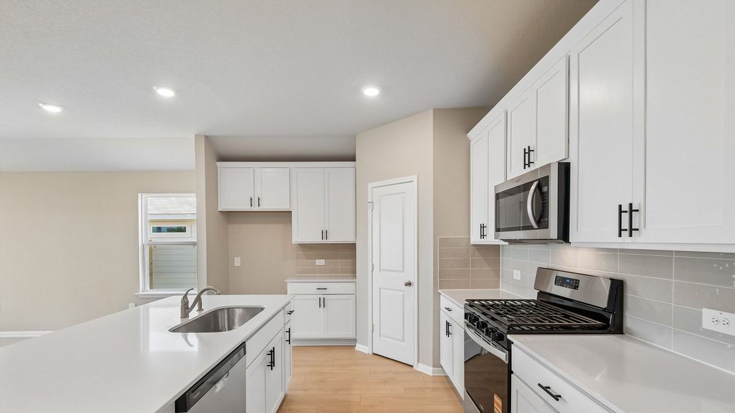 Furnished interior view inside a new home in Carillon, Manor (Image 8).