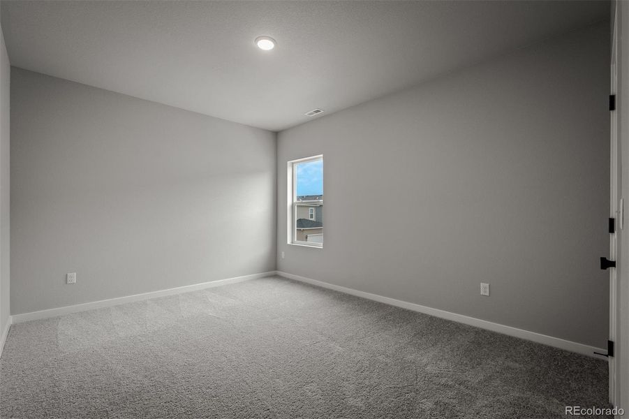 Spacious, unfurnished interior of a new home in Revel Crossing at Wolf Ranch – The Outlook Collection, Colorado Springs (Image 34).