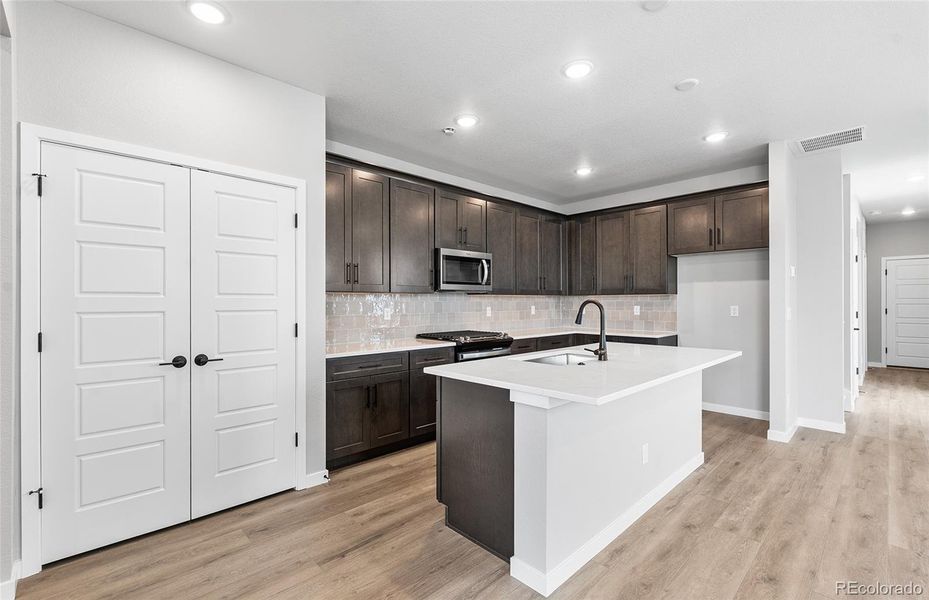 Furnished interior view inside a new home in Painted Prairie, Aurora (Image 8).