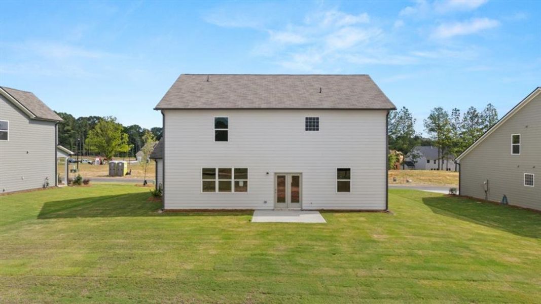 Exterior details and patio area of a home in Fairway 17 at Mirror Lake, Villa Rica (Image 3).