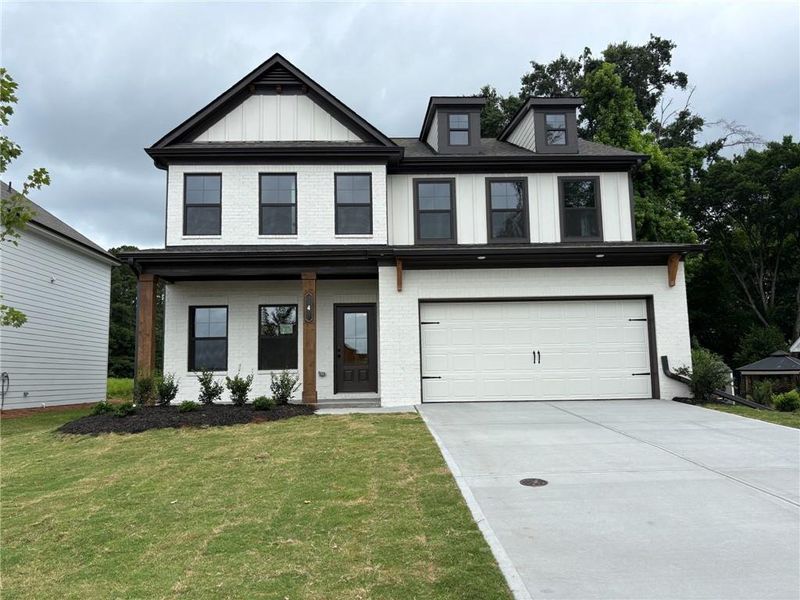 Front exterior of a new home in Greenefield, Cartersville, GA, highlighting curb appeal (Image 1). Front exterior of a new home in Greenefield, Cartersville, GA, highlighting curb appeal (Image 1).