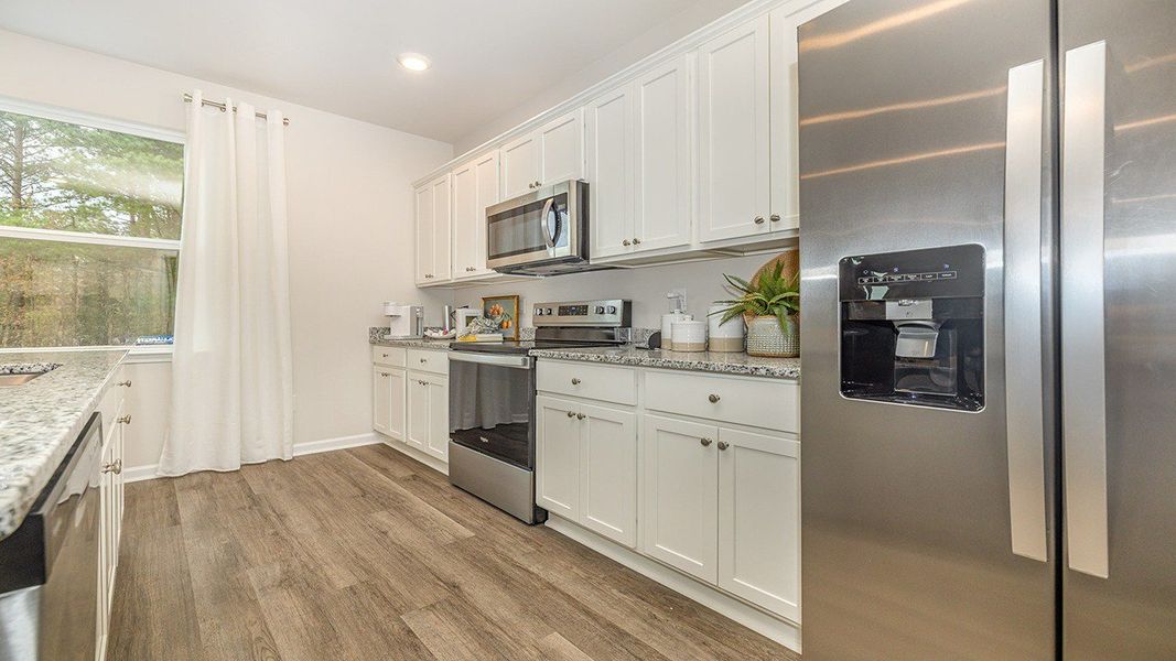 Furnished interior view inside a new home in Harper Meadows, Loris (Image 8).