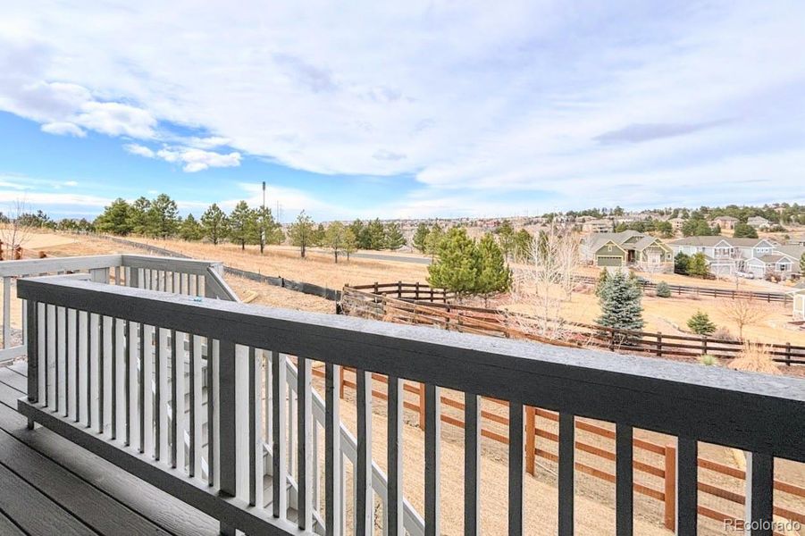 Exterior details and patio area of a home in Guilford Estates at Whispering Pines, Aurora (Image 2).