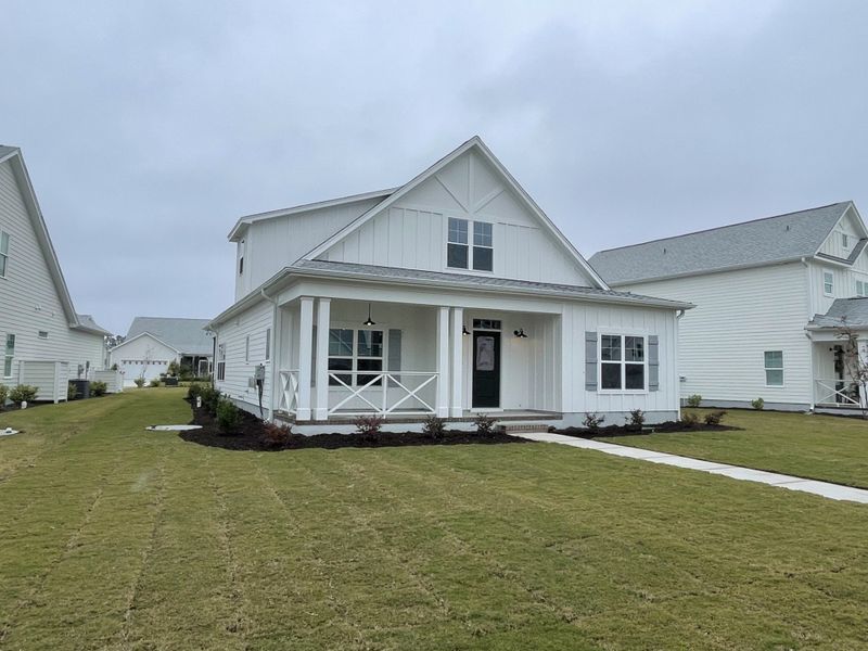 Exterior details and patio area of a home in The Sanctuary at Sunset Beach, Sunset Beach (Image 4).