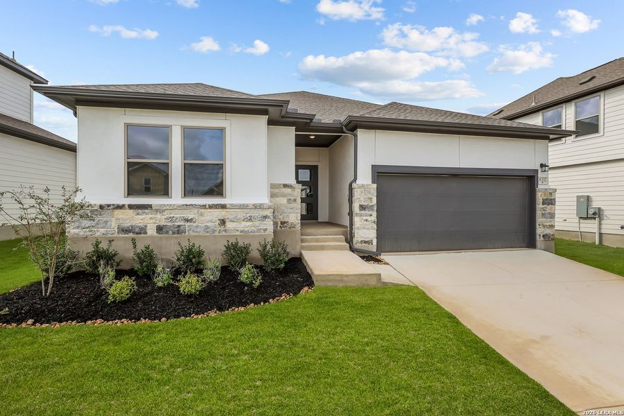 Front exterior of a new home in Garden Grove, San Antonio, TX, highlighting curb appeal (Image 20).