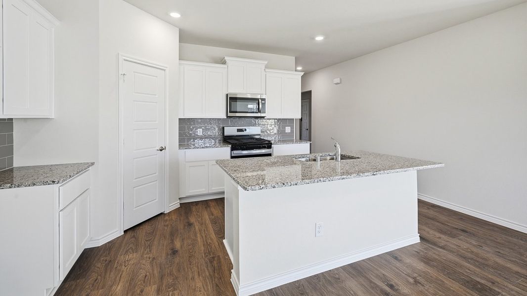 Representative furnished interior of a home built from the Devine by D.R. Horton in Winchester Crossing, Princeton (Image 6).