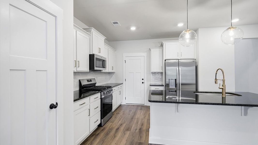 Accomplished layout with a first-class kitchen in this select villa community by DRB Homes Accomplished layout with a first-class kitchen in this select villa community by DRB Homes