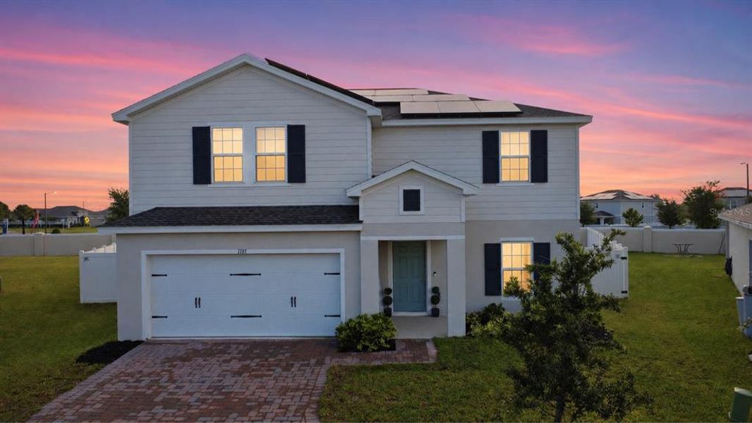 Front exterior of a new home in , Haines City, FL, highlighting curb appeal (Image 2). Front exterior of a new home in , Haines City, FL, highlighting curb appeal (Image 2).