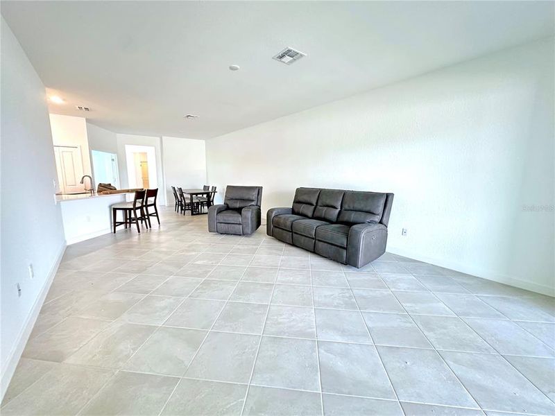 Furnished interior view inside a new home in Palm Lake at Coco Bay, Englewood (Image 12).