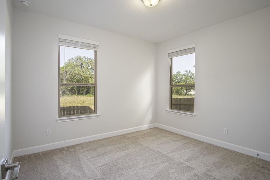 Representative unfurnished interior of a home built from the The Palmer by Rosehaven Homes in Magnolia Village, San Antonio (Image 14).