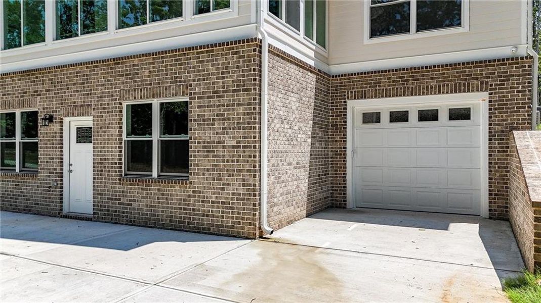 Front exterior of a new home in , Canton, GA, highlighting curb appeal (Image 27).