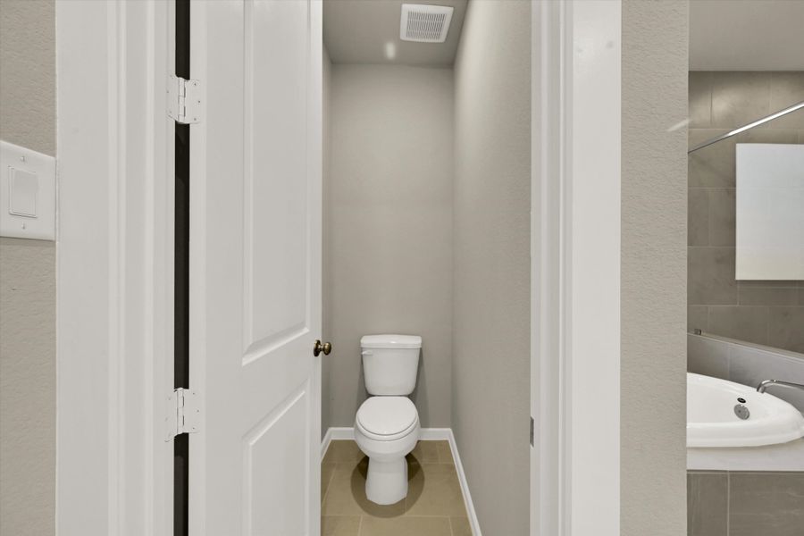 Furnished interior view inside a new home in Sunterra 50s, Katy (Image 16). Furnished interior view inside a new home in Sunterra 50s, Katy (Image 16).