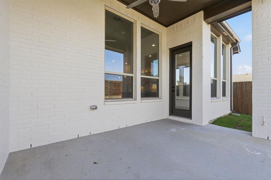 Exterior details and patio area of a home in Tavolo Park, Fort Worth (Image 3). Exterior details and patio area of a home in Tavolo Park, Fort Worth (Image 3).