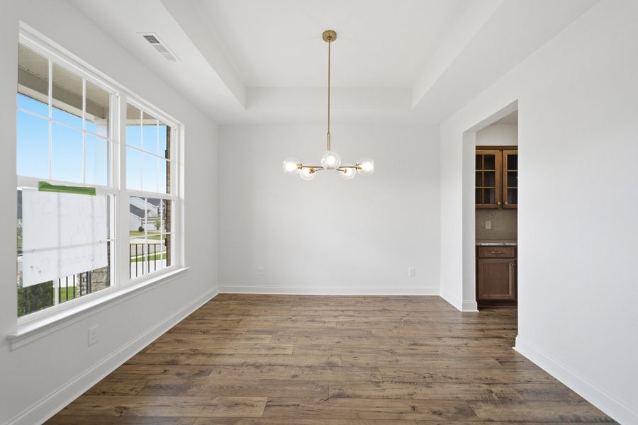 Spacious, unfurnished interior of a new home in Dorris Farm, White House (Image 26).