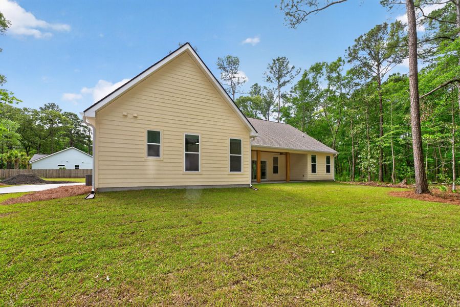 Exterior details and patio area of a home in , Johns Island (Image 23).
