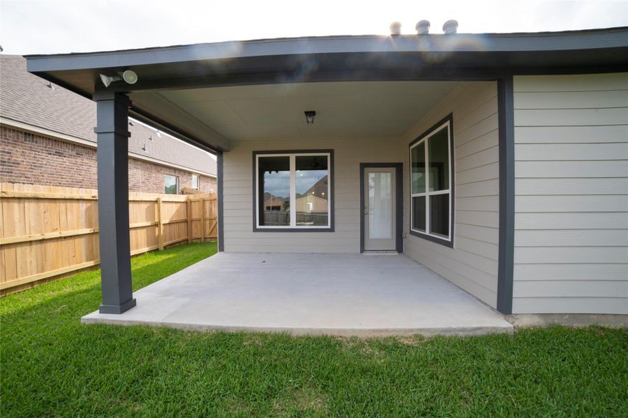 Exterior details and patio area of a home in , Brenham (Image 3).
