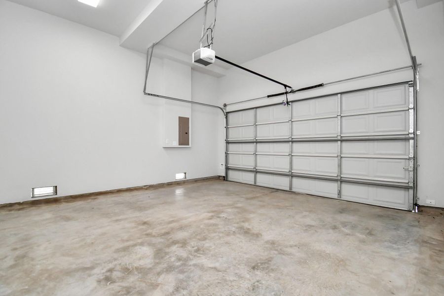 The extra wide garage offers plenty of room to accommodate larger vehicles, and the high ceilings are perfect for an abundance of drop-down storage areas! The extra wide garage offers plenty of room to accommodate larger vehicles, and the high ceilings are perfect for an abundance of drop-down storage areas!