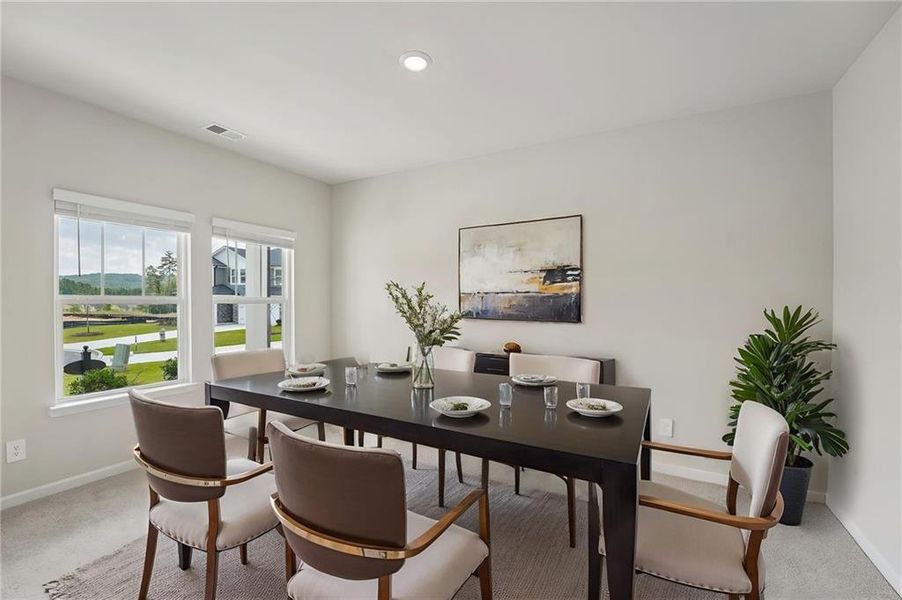 Furnished interior view inside a new home in Northwoods at Mirror Lake, Villa Rica (Image 10).