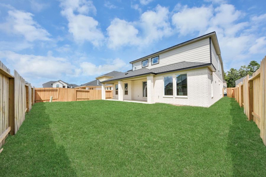 Experience outdoor living at its finest on this expansive covered patio, thoughtfully designed for BBQs and delightful outdoor dining. Experience outdoor living at its finest on this expansive covered patio, thoughtfully designed for BBQs and delightful outdoor dining.