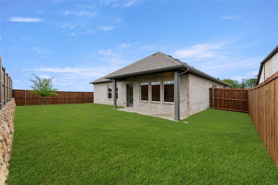 Exterior details and patio area of a home in Creekside, Royse City (Image 20).