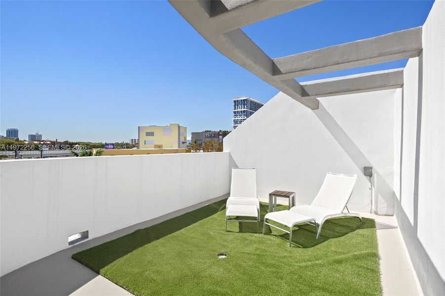 Exterior details and patio area of a home in , Miami (Image 2). Exterior details and patio area of a home in , Miami (Image 2).