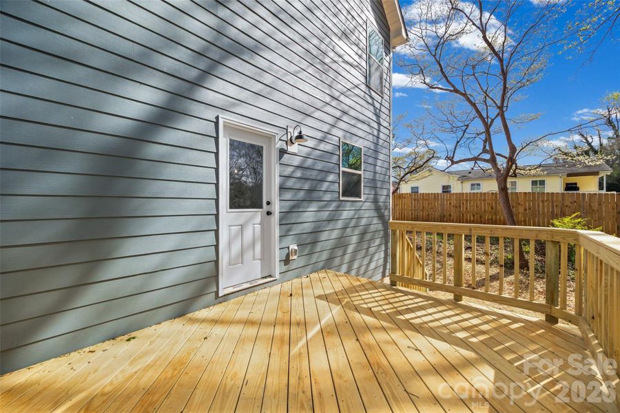 Exterior details and patio area of a home in , Belmont (Image 4).