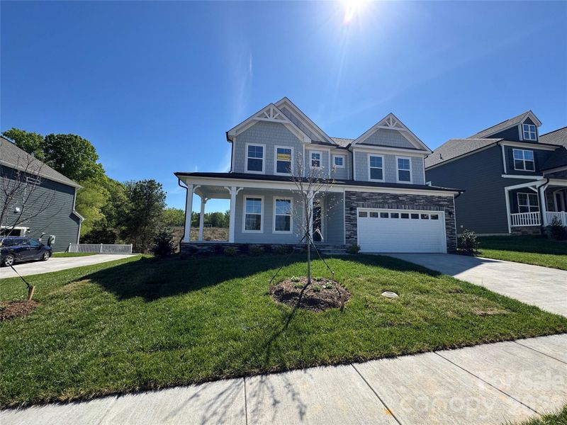 Front exterior of a new home in Robinson Oaks, Gastonia, NC, highlighting curb appeal (Image 23).