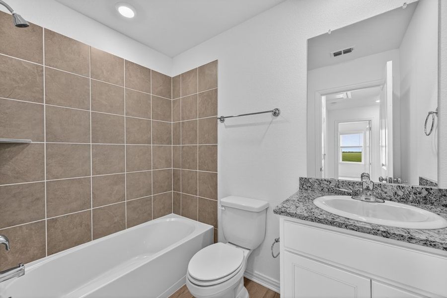 Furnished interior view inside a new home in River Ridge, Crandall (Image 11).
