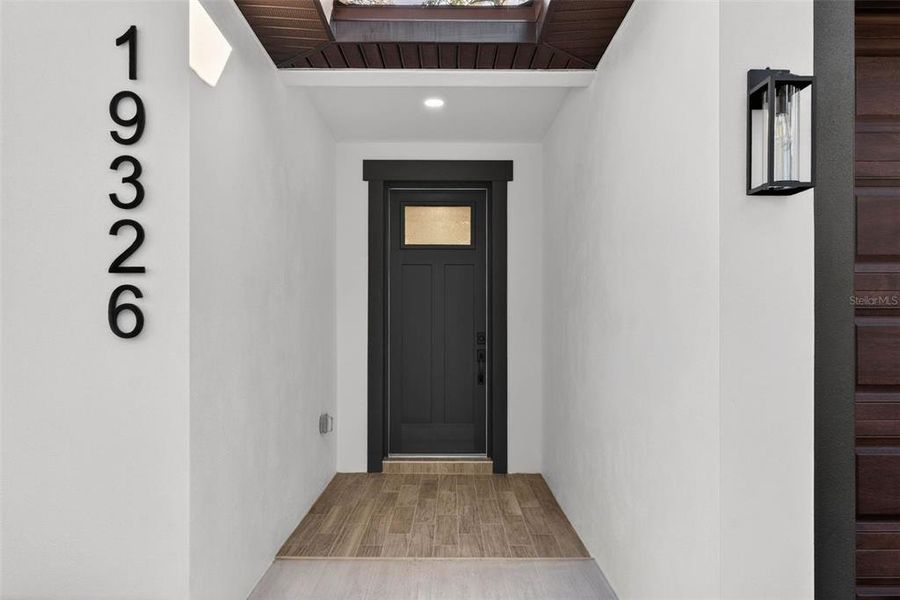 Exterior details and patio area of a home in , Brooksville (Image 3).