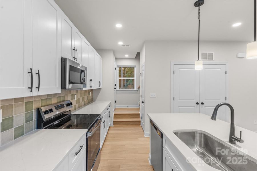 Furnished interior view inside a new home in , Statesville (Image 7).