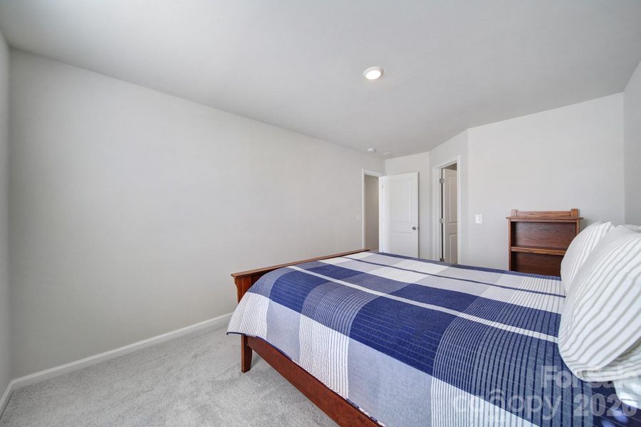 Guest Bedroom 1 with walk-in closet