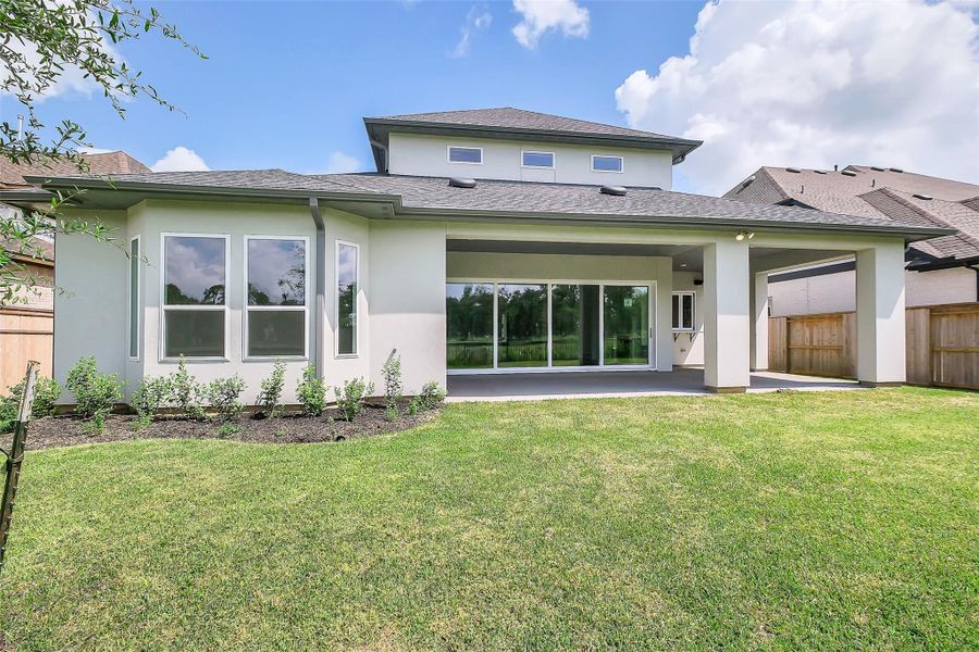 Exterior details and patio area of a home in Sienna 65', Missouri City (Image 3).