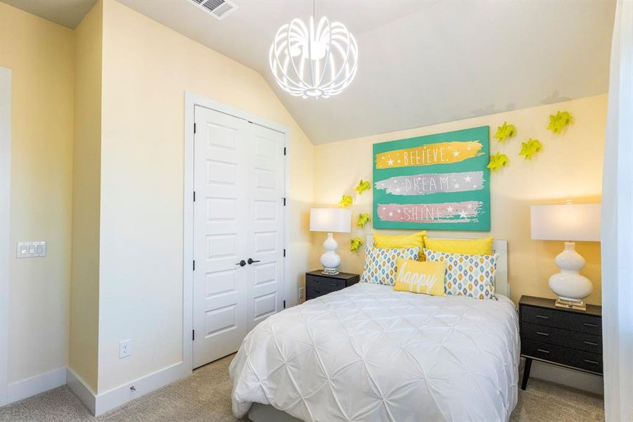 The front bedroom is so bright & cheery.