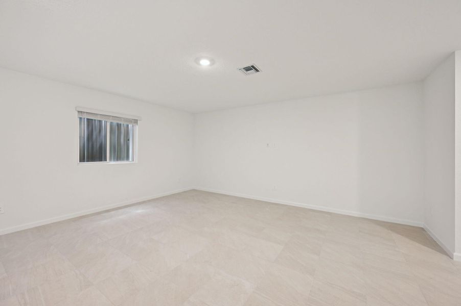 Spacious, unfurnished interior of a new home in Meritage Homes at Terra Lago - Premier Series, Indiantown (Image 12).