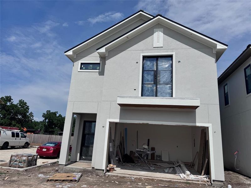 Front exterior of a new home in , Stafford, TX, highlighting curb appeal (Image 29).