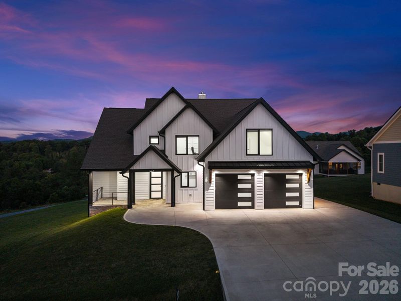 Front exterior of a new home in , Candler, NC, highlighting curb appeal (Image 34). Front exterior of a new home in , Candler, NC, highlighting curb appeal (Image 34).