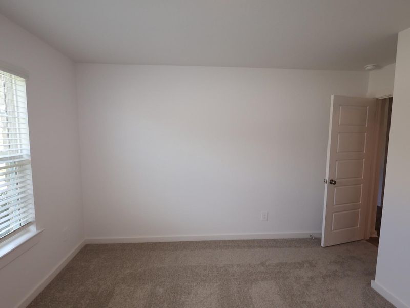 Spacious, unfurnished interior of a new home in Pinewood at Grand Texas, New Caney (Image 23). Spacious, unfurnished interior of a new home in Pinewood at Grand Texas, New Caney (Image 23).