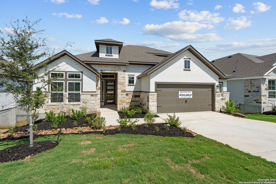 Front exterior of a new home in Esperanza – New Phase Now Selling, Boerne, TX, highlighting curb appeal (Image 27). Front exterior of a new home in Esperanza – New Phase Now Selling, Boerne, TX, highlighting curb appeal (Image 27).