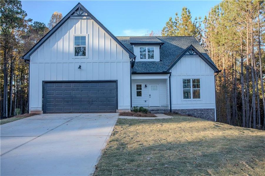 Front exterior of a new home in , Villa Rica, GA, highlighting curb appeal (Image 19).