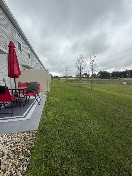 Exterior details and patio area of a home in The Towns at Laurel Commons, Ocala (Image 30).