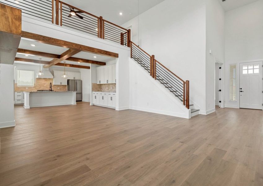 The game room overlooks the huge living room. The game room overlooks the huge living room.