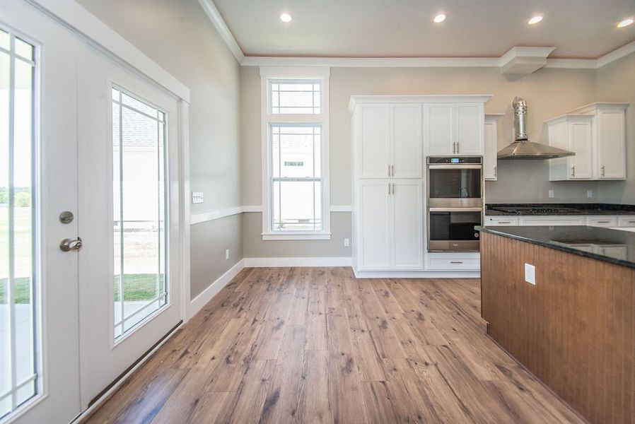 Representative unfurnished interior of a home built from the Beaumont Elite by Enchanted Homes in Pointe Summit, Slater-Marietta (Image 43).